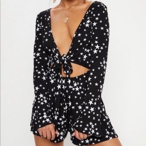 PrettyLittleThing Black Star Romper